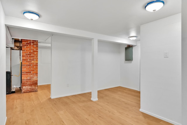 411 W 26th Ave, Spokane, WA 99203 - finished basement with light wood finished floors, electric panel, and baseboards