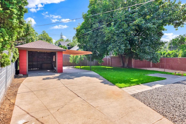411 W 26th Ave, Spokane, WA 99203 - view of yard with concrete driveway and a patio area