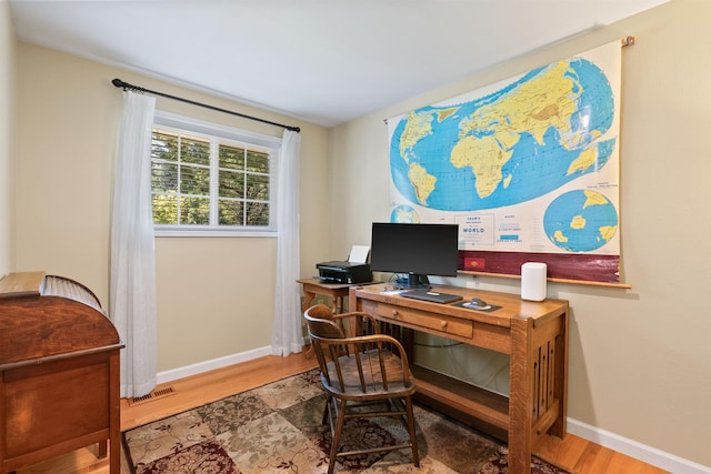 11605 N Merlin Dr, Spokane, WA 99218 - home office featuring wood finished floors and baseboards