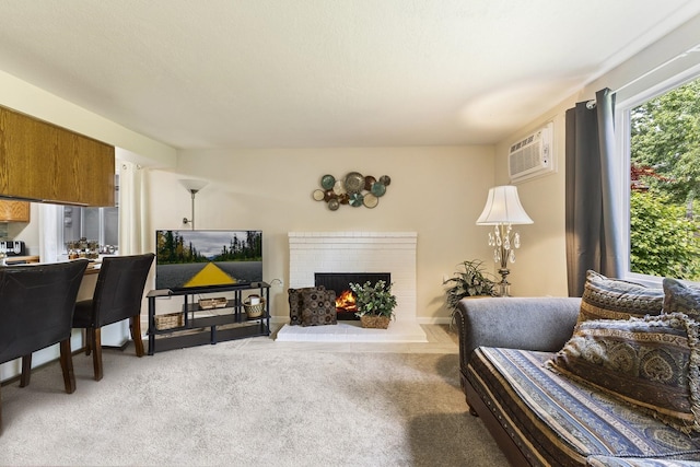 202 E Weile Ave Unit 2, Spokane, WA 99208 - living room featuring a wall unit AC, light colored carpet, and a fireplace