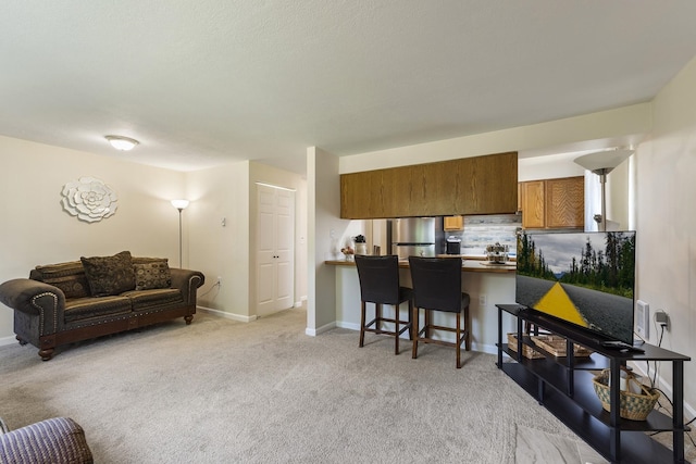202 E Weile Ave Unit 2, Spokane, WA 99208 - living room with light carpet and baseboards