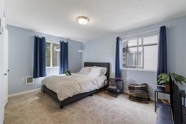 202 E Weile Ave Unit 2, Spokane, WA 99208 - carpeted bedroom with baseboards