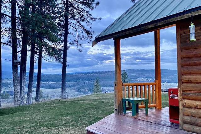 31579 E Hume Rd, Davenport, WA 99122 - wooden terrace with a yard and a mountain view