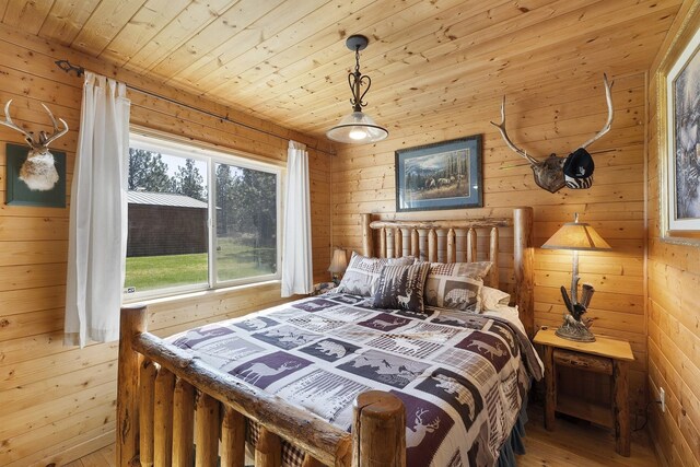 31579 E Hume Rd, Davenport, WA 99122 - bedroom featuring wooden walls, hardwood / wood-style flooring, and wooden ceiling