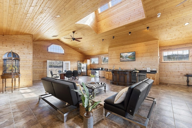 31579 E Hume Rd, Davenport, WA 99122 - living room with wooden walls, wooden ceiling, high vaulted ceiling, and a ceiling fan
