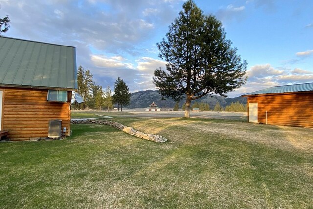 31579 E Hume Rd, Davenport, WA 99122 - view of grassy yard with a mountain view