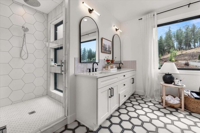9610 S Mullen Hill Rd, Spokane, WA 99224 - full bath featuring plenty of natural light, tiled shower, and double vanity
