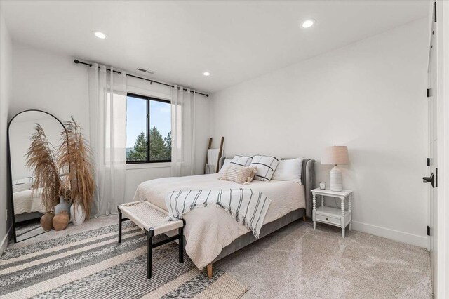 9610 S Mullen Hill Rd, Spokane, WA 99224 - bedroom with baseboards, recessed lighting, and light carpet