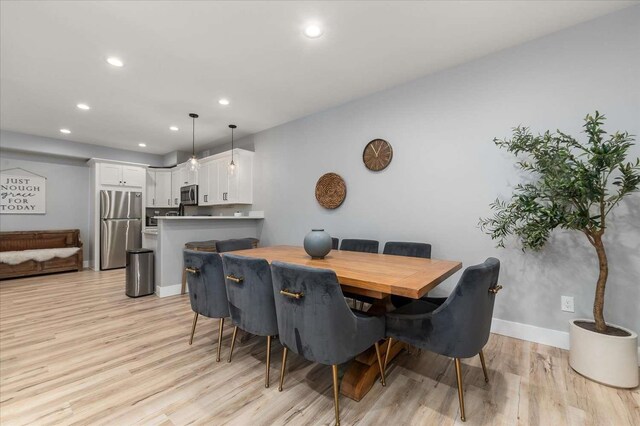 9610 S Mullen Hill Rd, Spokane, WA 99224 - dining room featuring recessed lighting, light wood-style flooring, and baseboards