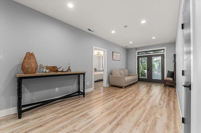 9610 S Mullen Hill Rd, Spokane, WA 99224 - foyer entrance featuring wood finished floors, recessed lighting, baseboards, and french doors