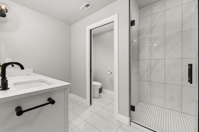 9610 S Mullen Hill Rd, Spokane, WA 99224 - full bath with a stall shower, toilet, baseboards, and double vanity