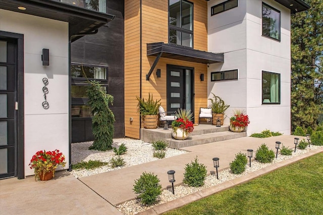 9610 S Mullen Hill Rd, Spokane, WA 99224 - view of exterior entry with covered porch and stucco siding
