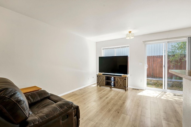 11212 E 4th Ave Unit D, Spokane Valley, WA 99206 - living area featuring wood finished floors and baseboards