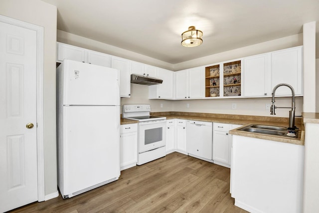 11212 E 4th Ave Unit D, Spokane Valley, WA 99206 - kitchen with white appliances, under cabinet range hood, a sink, and light wood-style flooring