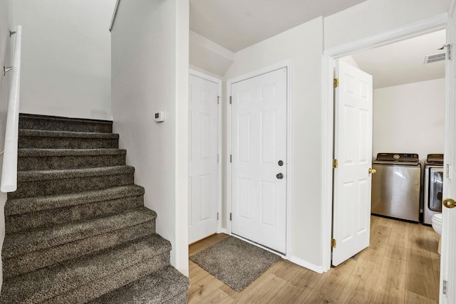 11212 E 4th Ave Unit D, Spokane Valley, WA 99206 - stairs featuring wood finished floors and separate washer and dryer