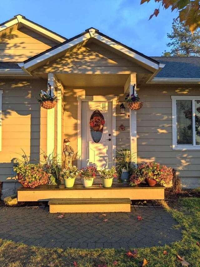 633C Garvey Rd, Colville, WA 99114 - doorway to property with roof with shingles