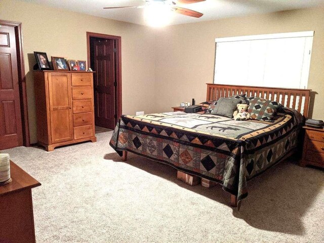 633C Garvey Rd, Colville, WA 99114 - bedroom with light carpet and ceiling fan