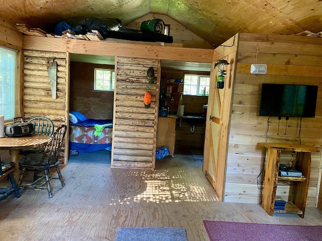 TBD Buck Creek Rd, Newport, WA 99156 - bedroom featuring vaulted ceiling, log walls, and wood finished floors