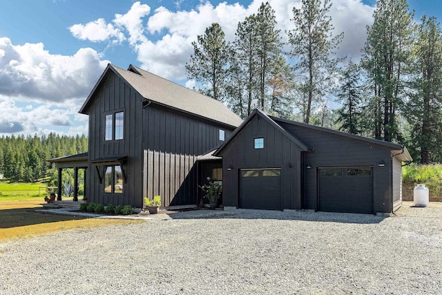 16106 N Mt Spokane Park Dr, Mead, WA 99021 - modern farmhouse style home with board and batten siding, driveway, and a garage
