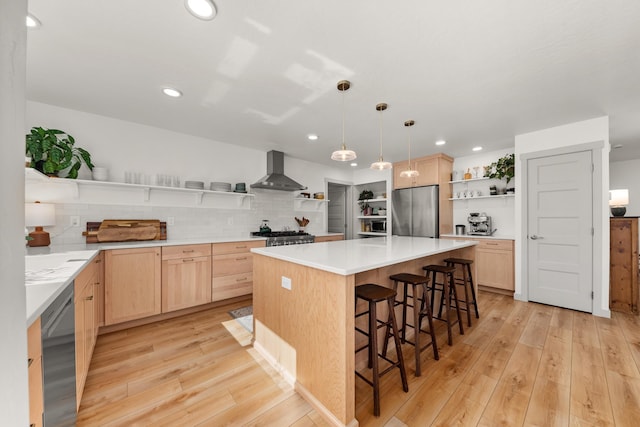 16106 N Mt Spokane Park Dr, Mead, WA 99021 - kitchen featuring open shelves, appliances with stainless steel finishes, wall chimney range hood, light brown cabinets, and light wood finished floors