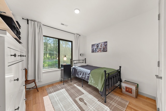 16106 N Mt Spokane Park Dr, Mead, WA 99021 - bedroom featuring light wood-type flooring, baseboards, and recessed lighting