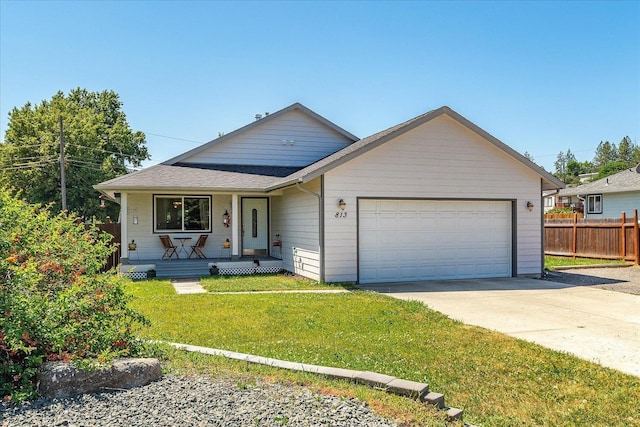 813 Tamarack Ln, Chewelah, WA 99109 - view of front facade with a porch, an attached garage, driveway, and a shingled roof