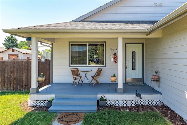 813 Tamarack Ln, Chewelah, WA 99109 - doorway to property featuring roof with shingles and covered porch