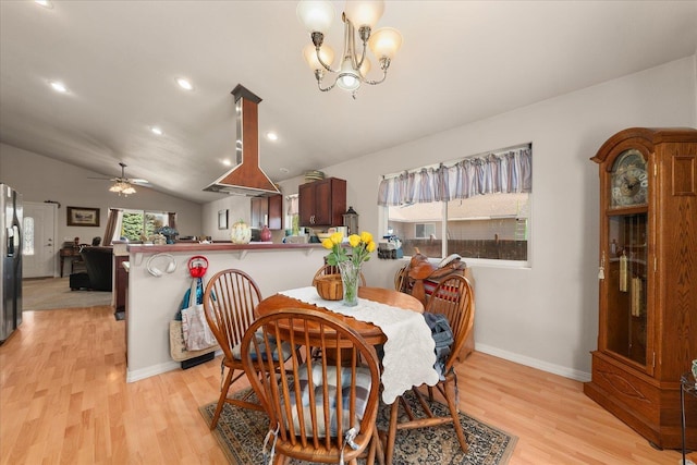 813 Tamarack Ln, Chewelah, WA 99109 - dining space with light wood finished floors, vaulted ceiling, recessed lighting, baseboards, and ceiling fan