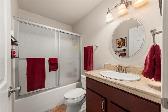 813 Tamarack Ln, Chewelah, WA 99109 - bathroom with vanity, toilet, and shower / bath combination with glass door