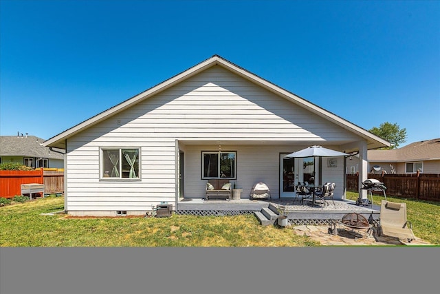 813 Tamarack Ln, Chewelah, WA 99109 - rear view of house featuring a fire pit