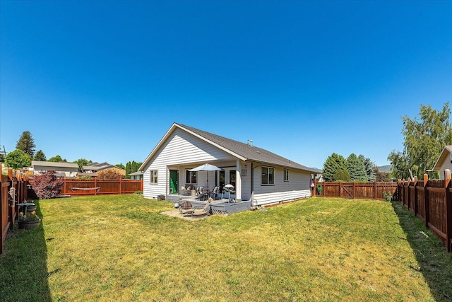 813 Tamarack Ln, Chewelah, WA 99109 - rear view of house featuring a patio area