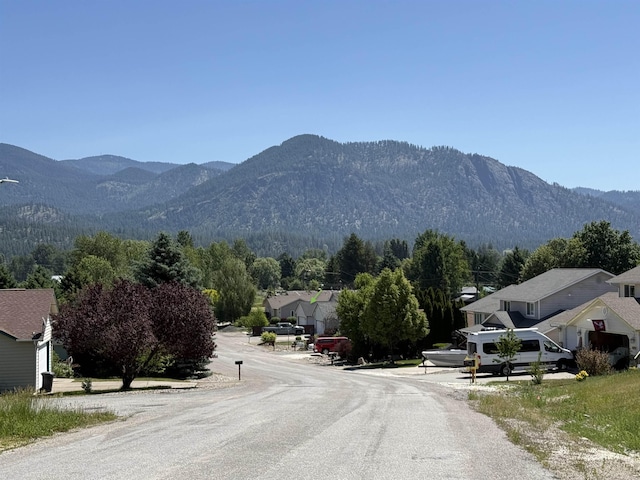 813 Tamarack Ln, Chewelah, WA 99109 - mountain view featuring nearby suburban area