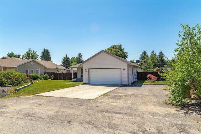 813 Tamarack Ln, Chewelah, WA 99109 - single story home with driveway and a garage