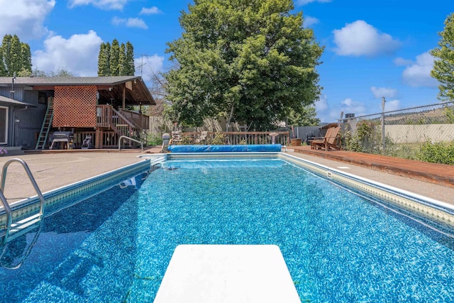 24615 E Joseph Ave, Otis Orchards, WA 99027 - view of swimming pool featuring a diving board, a fenced backyard, stairs, and a patio