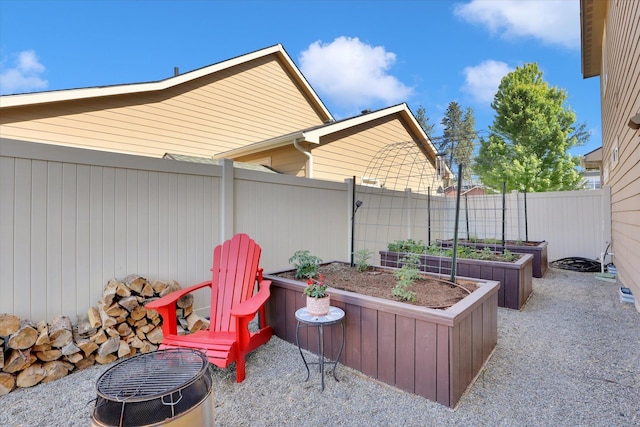 726 E Colbert Rd, Colbert, WA 99005 - view of patio with a vegetable garden