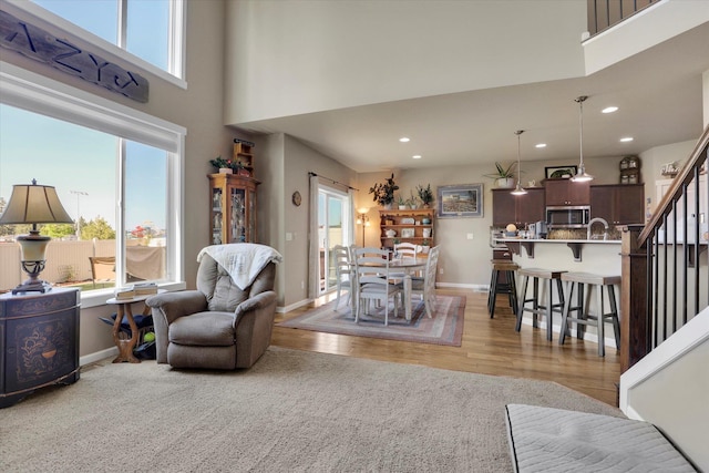 726 E Colbert Rd, Colbert, WA 99005 - living room featuring light wood-style floors, a towering ceiling, and recessed lighting