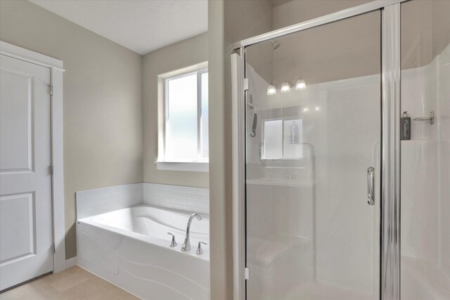 18381 E 17th Ave, Greenacres, WA 99016 - bathroom with a bath, a shower stall, and tile patterned floors