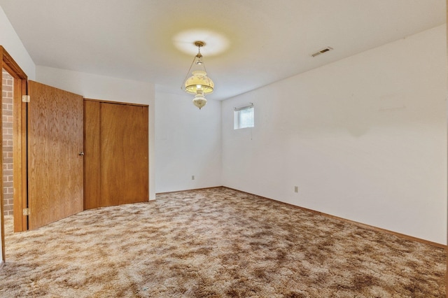 1621 E 65th Ave, Spokane, WA 99223 - unfurnished bedroom with carpet floors and a closet