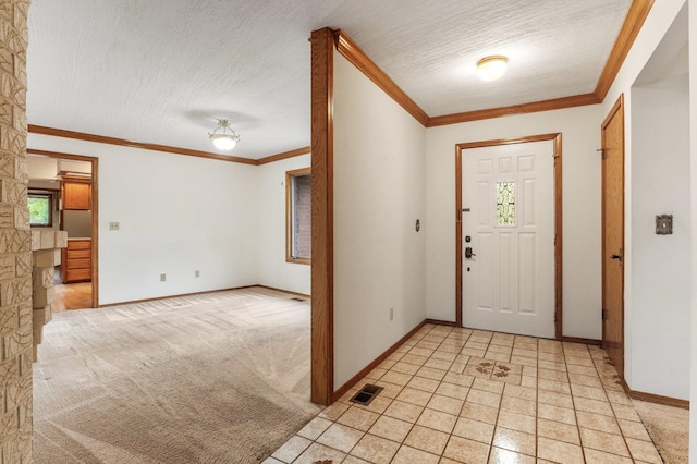 1621 E 65th Ave, Spokane, WA 99223 - foyer entrance with ornamental molding and a textured ceiling