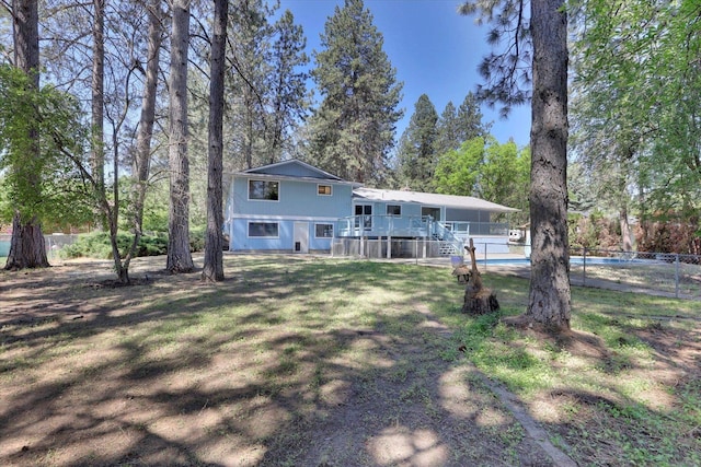 4717 S Skipworth Rd, Spokane Valley, WA 99206 - back of house with stairs and a wooden deck