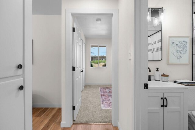1501 N Lily Rd, Spokane, WA 99212 - full bath with vanity, wood finished floors, and curtained shower