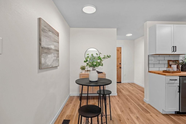 1501 N Lily Rd, Spokane, WA 99212 - dining area with light wood finished floors