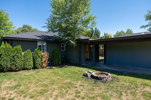 1501 N Lily Rd, Spokane, WA 99212 - view of front of property with a fire pit and a front yard