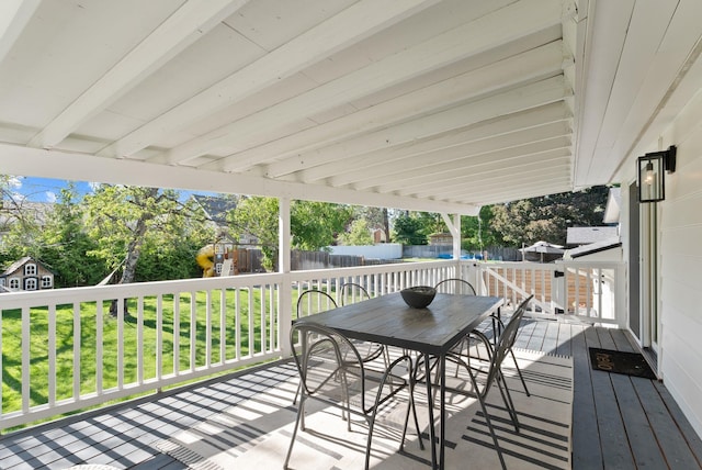 4118 S Stone St, Spokane, WA 99223 - wooden terrace with a playground, outdoor dining space, and view of wooded area