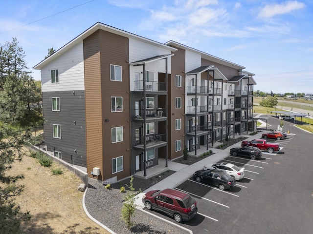 12608 E Nora Ave, Spokane Valley, WA 99216 - view of apartment building / complex with uncovered parking