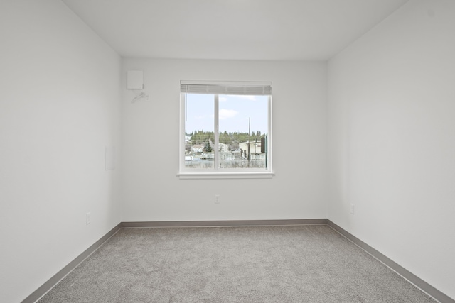 12608 E Nora Ave, Spokane Valley, WA 99216 - spare room with carpet flooring and baseboards