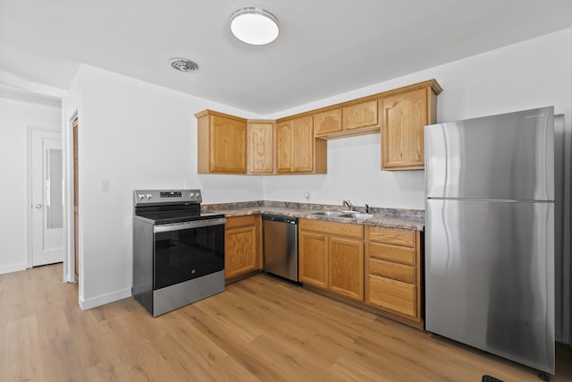 3927 E Fairview Ave, Spokane, WA 99217 - kitchen featuring appliances with stainless steel finishes and light wood finished floors