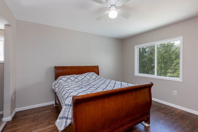 337 Lehigh Hill Rd, Metaline Falls, WA 99153 - bedroom with multiple windows, dark wood finished floors, and ceiling fan