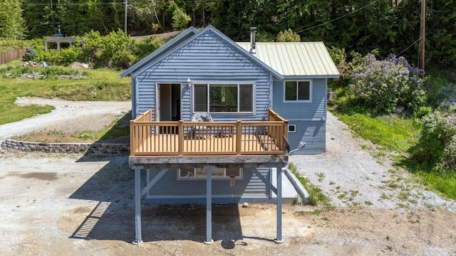 337 Lehigh Hill Rd, Metaline Falls, WA 99153 - back of property with a deck and a metal roof