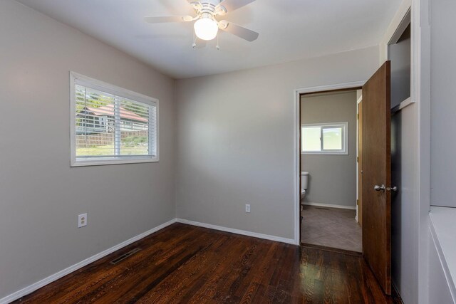 337 Lehigh Hill Rd, Metaline Falls, WA 99153 - unfurnished room with dark wood-style flooring and a ceiling fan